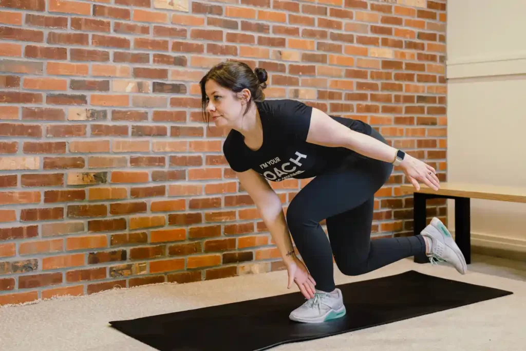 Tone Your Arms in Just One Week: Achieve Results Without the Gym! 1 A person exercising their arms at home with light weights Hassocks
